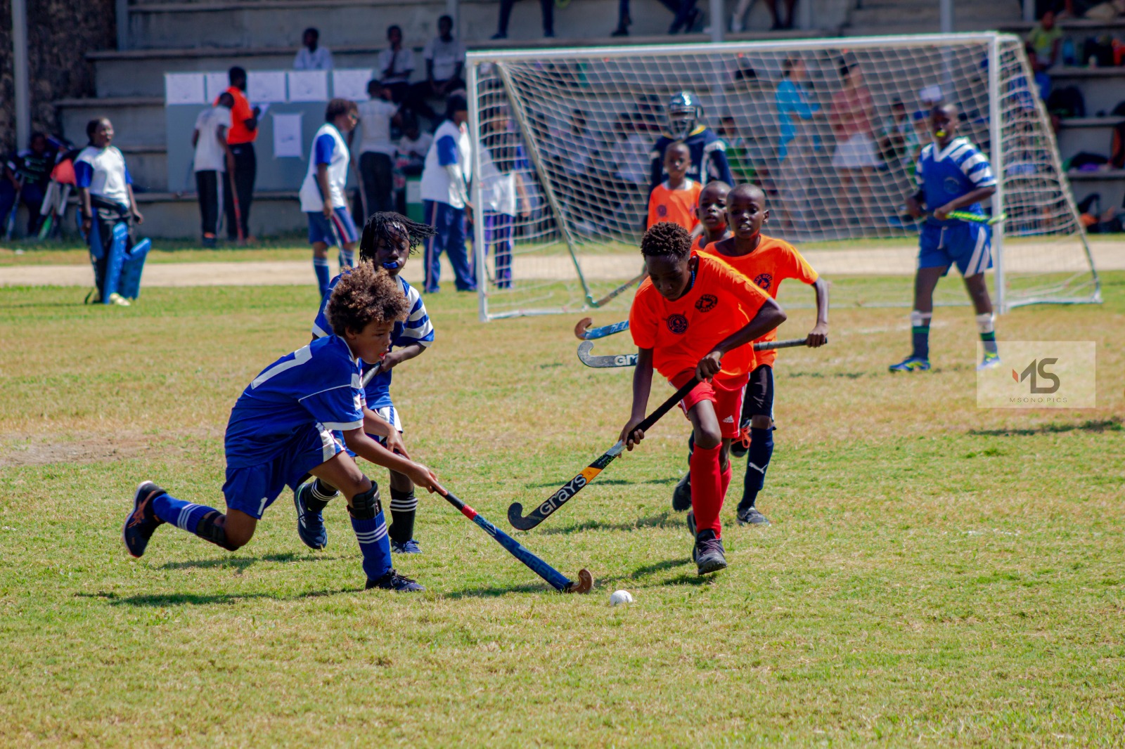 Grassroots Tussling for the ball